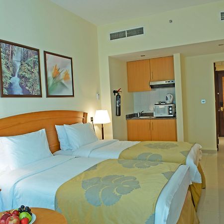 Golden Tulip Sharjah Aparthotel Екстериор снимка