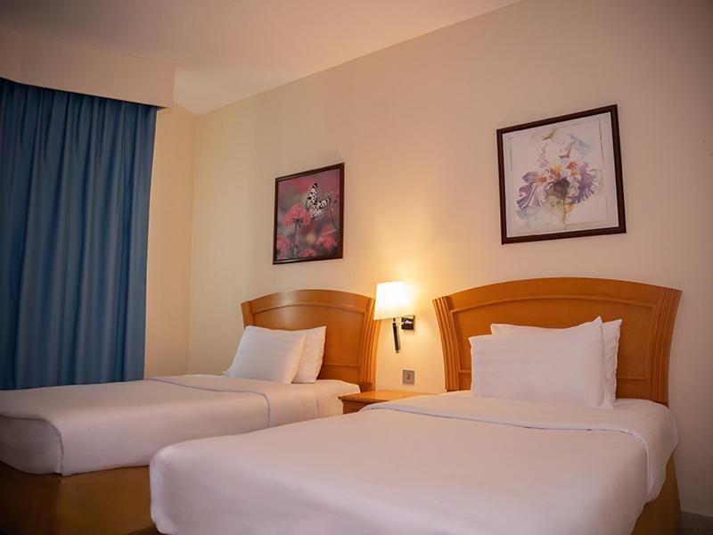 Golden Tulip Sharjah Aparthotel Екстериор снимка